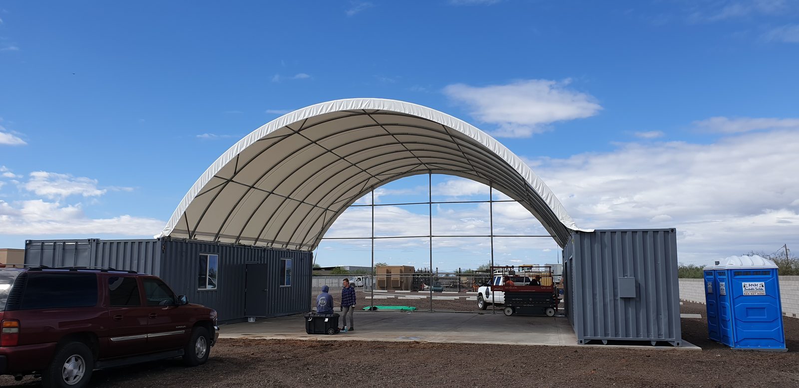 Field-Assembled Double-Truss Container Shelter on ISO Side Walls